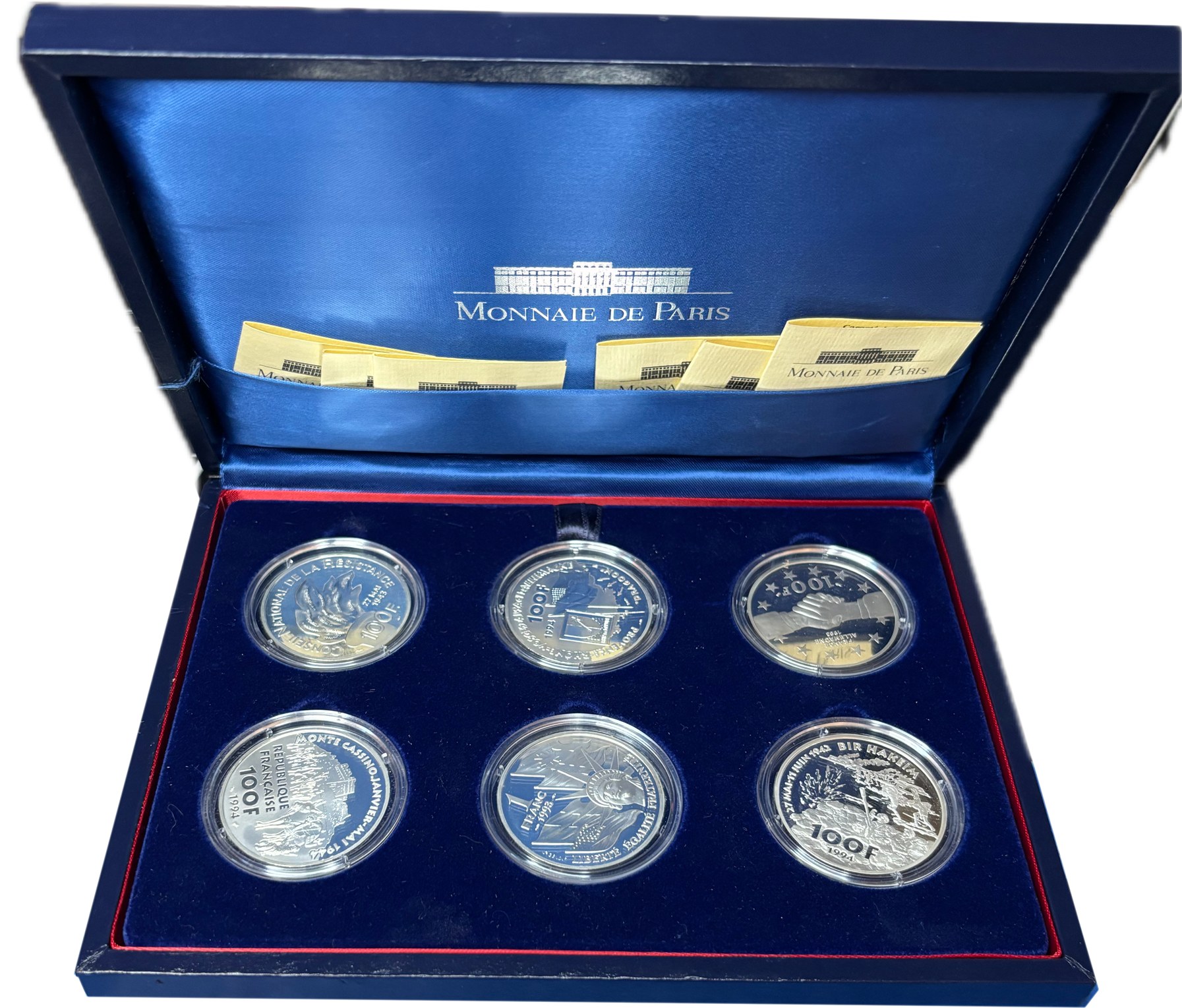 Coffret MDP 50e Libération avec 5 pièces 100 F argent et 1 F Liberté Statue dans présentation bleu nuit